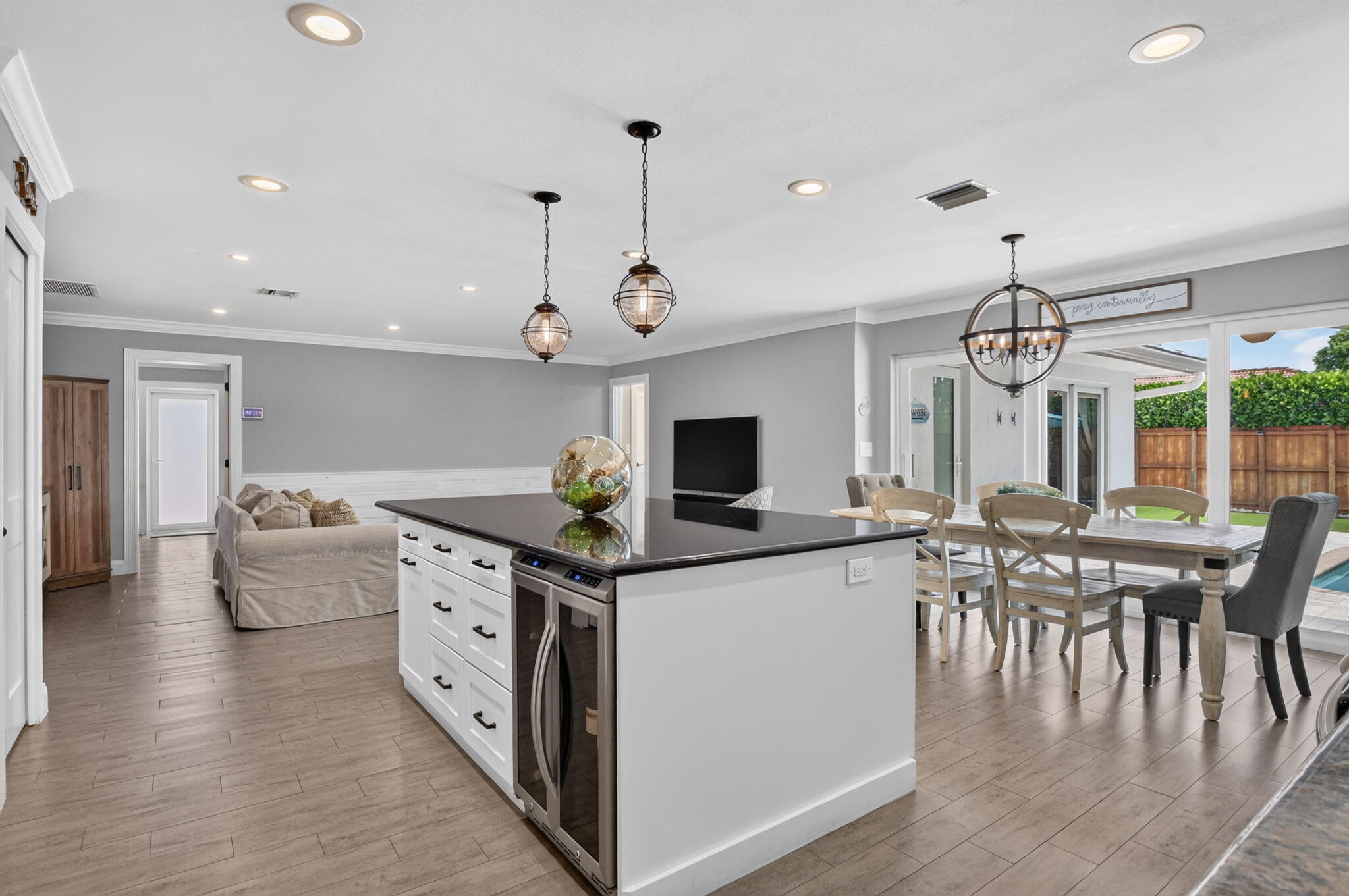 Kitchen and dining area opening to the pool at 631 SW 17th Street