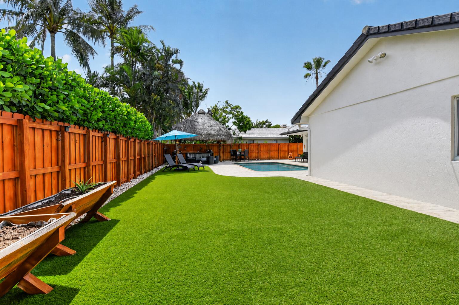 Fenced turf backyard at 631 SW 17th Street