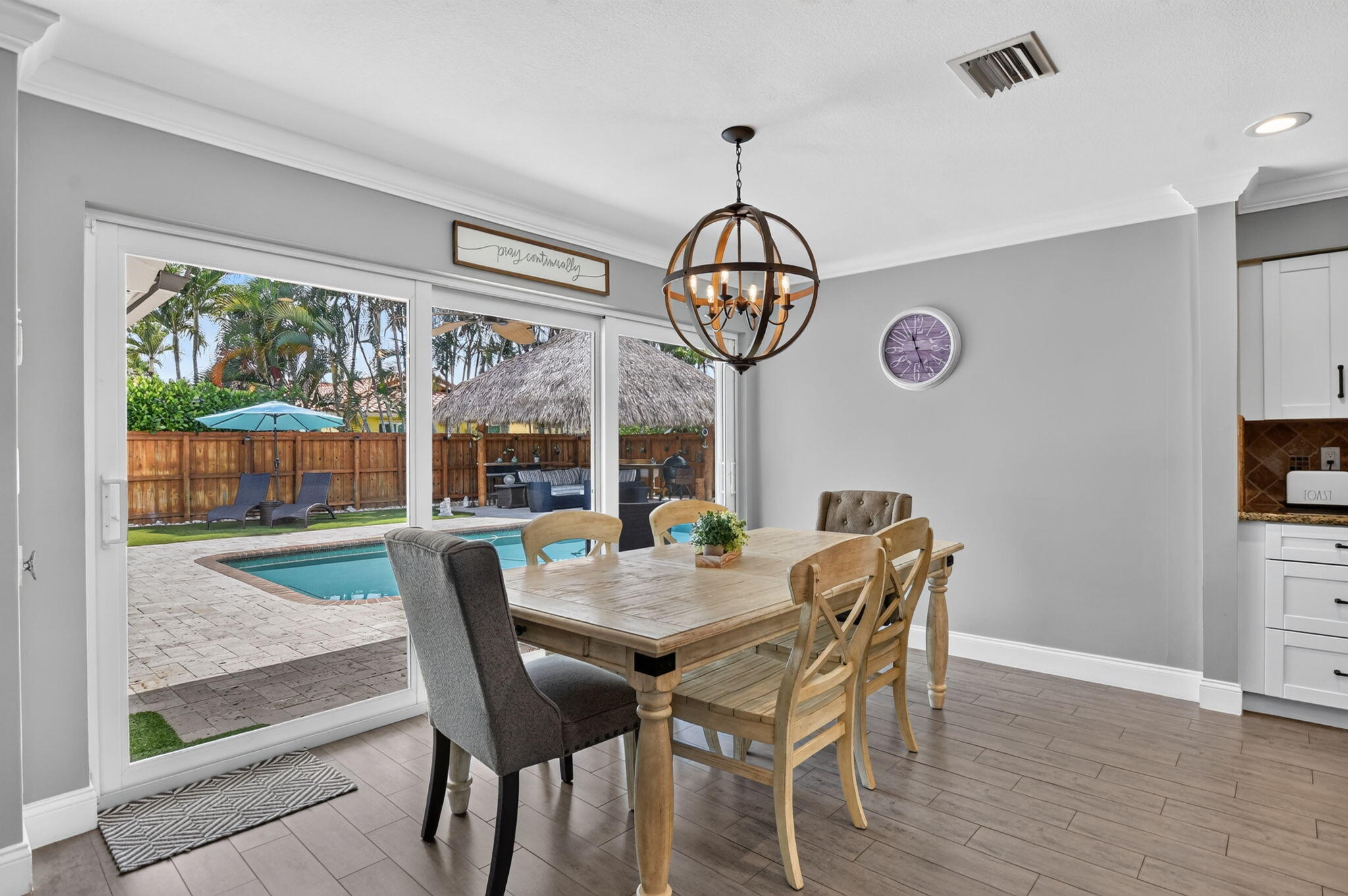 Dining area overlooking the pool at 631 SW 17th Street