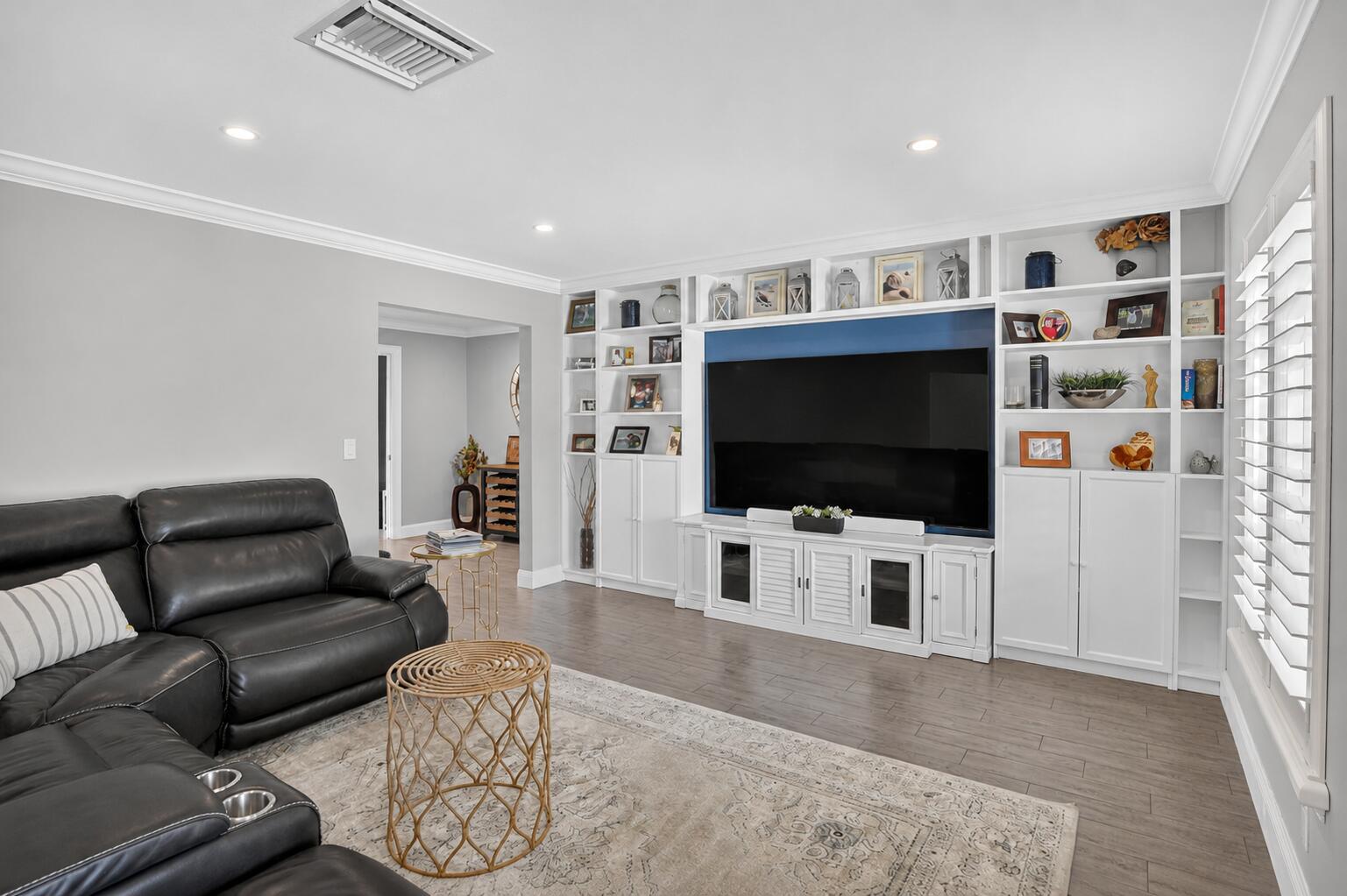Family room with custom built-ins at 631 SW 17th Street